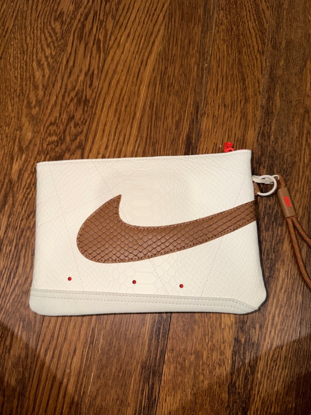 Nike White Wristlet Pouch with Brown Swoosh Accent